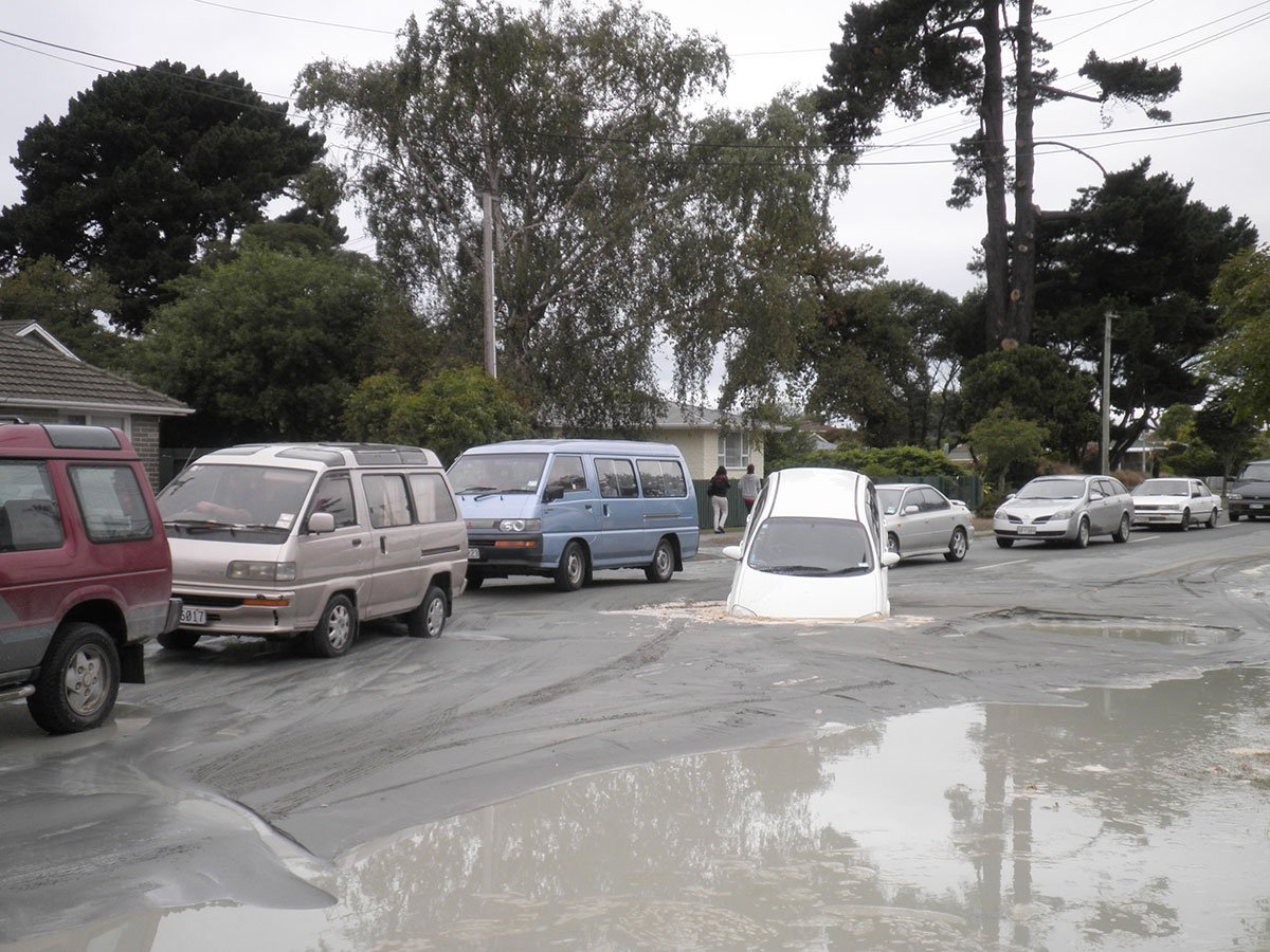 A white station wagon in liquefaction on Pages Road